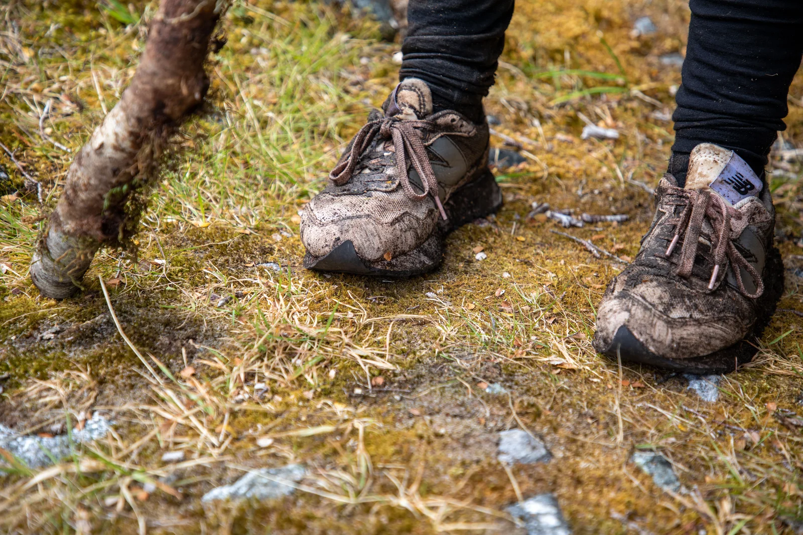 Well-worn hiking boots on a trail — a boot that has already moulded to your foot is the one that will not hurt you